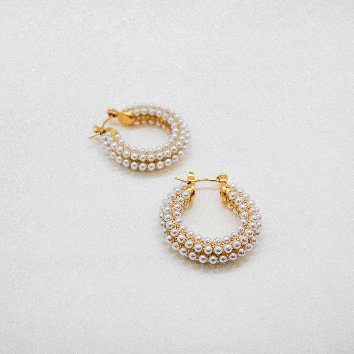The pearl earrings
